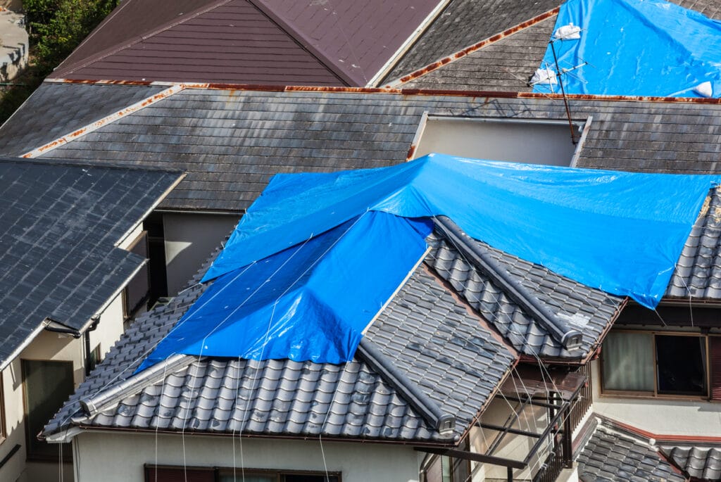 Image of tarped roof applied following weather emergency outside Columbus, OH